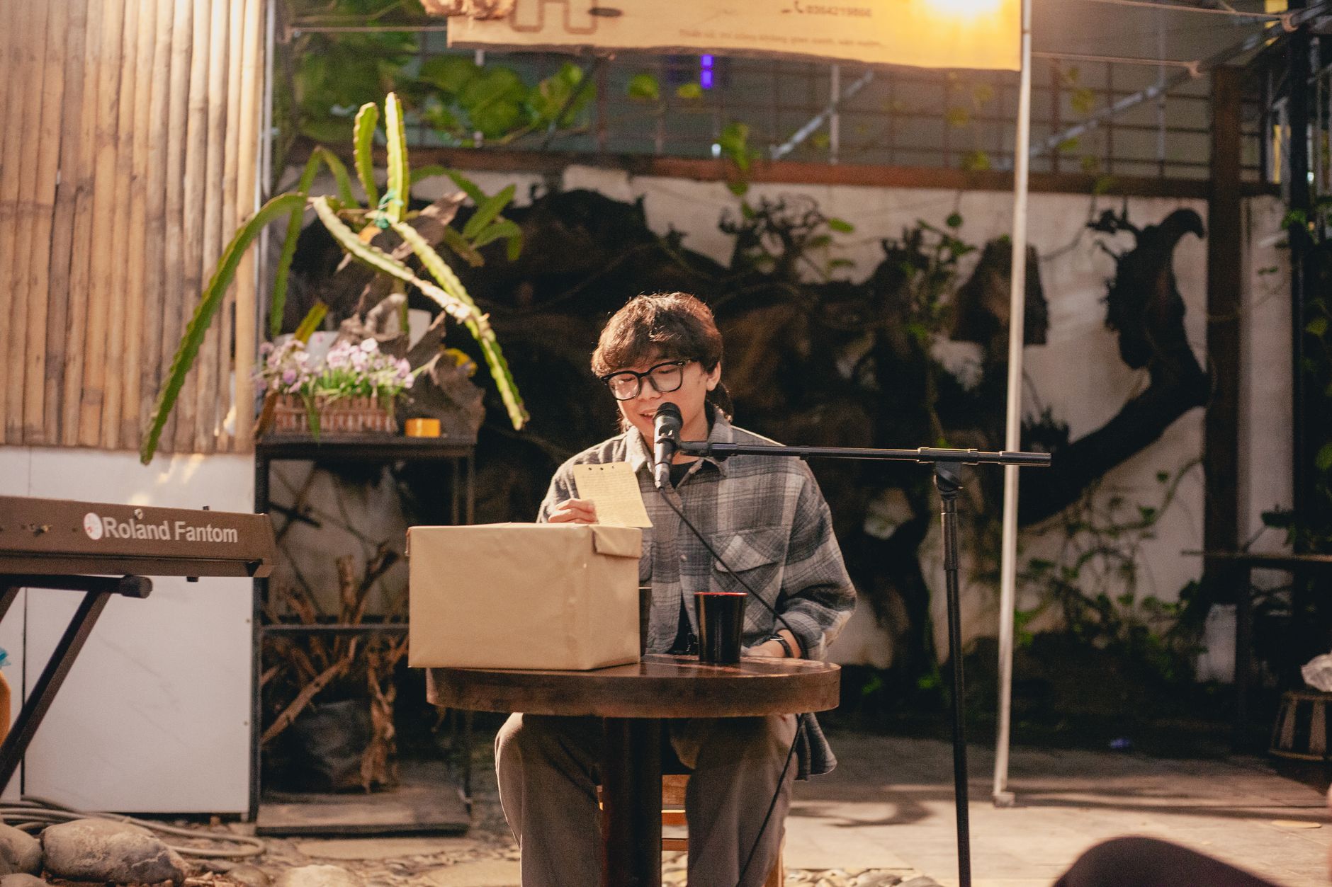 outdoor poetry reading by a young artist