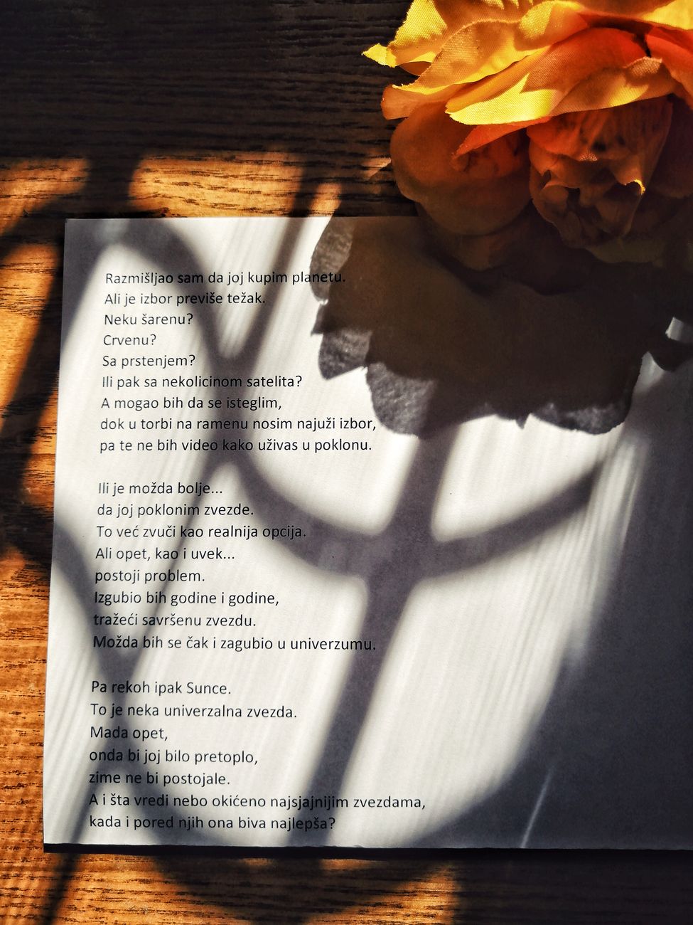 poem on a sheet under shadows